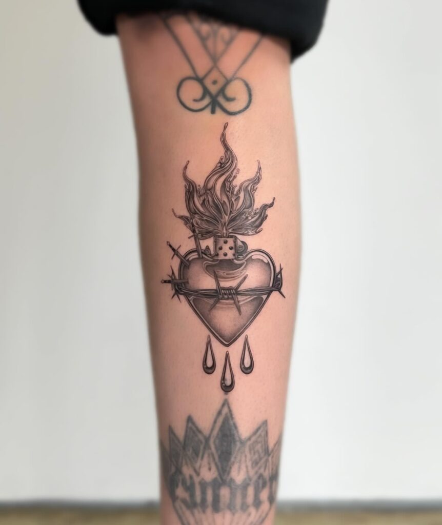 Intricate Sacred Heart with Radiating Flames Tattoo Tattoo Design