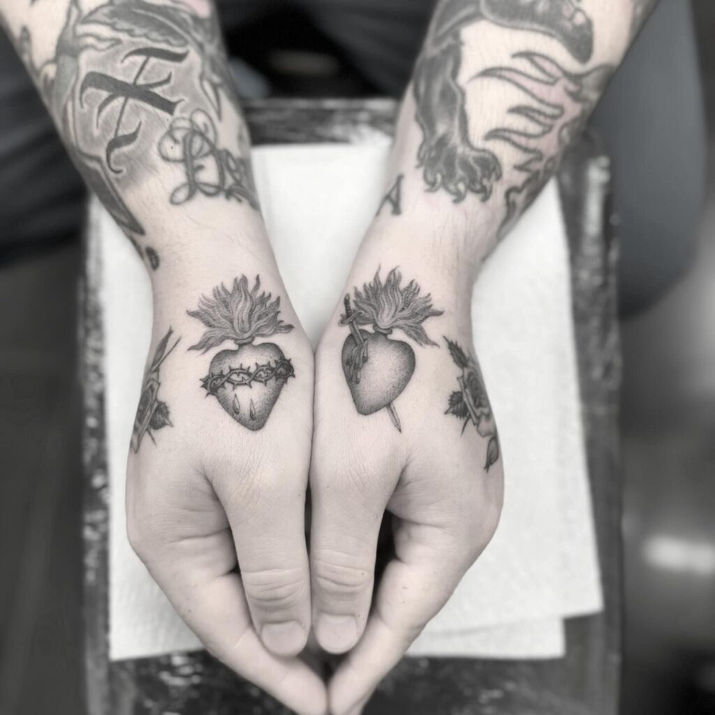 Minimalist Sacred Heart with Crown of Thorns and Flame Tattoo Design