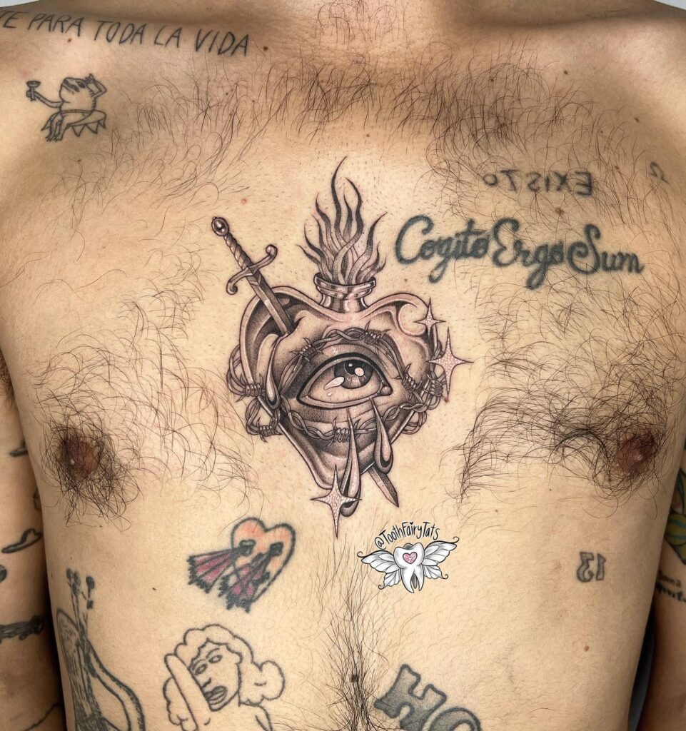 Sacred Heart Chest Tattoo with Nails and Radiating Lines Tattoo Design