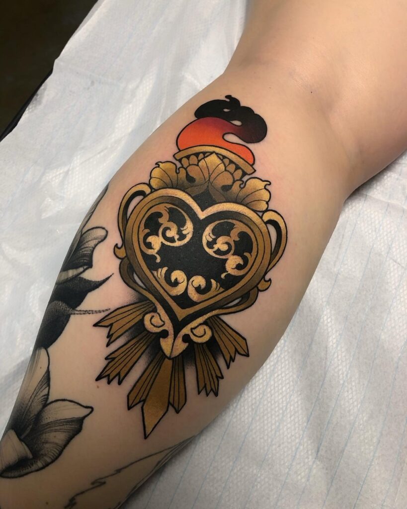 Sacred Heart Tattoo with Radiating Light Tattoo Design