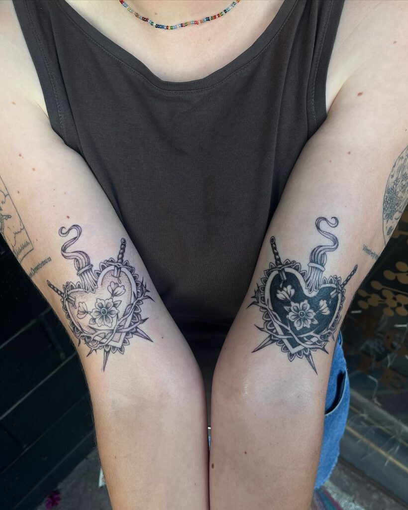 Sacred Heart Tattoo with Roses and Sword Tattoo Design