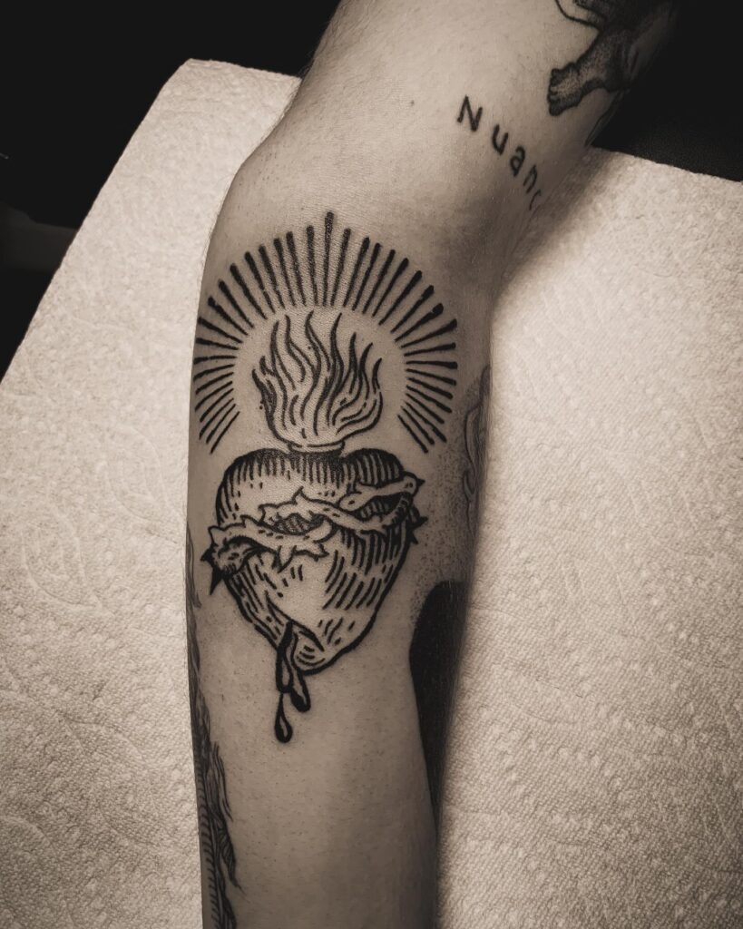 Sacred Heart with Sword and Radiant Rays Tattoo Tattoo Design