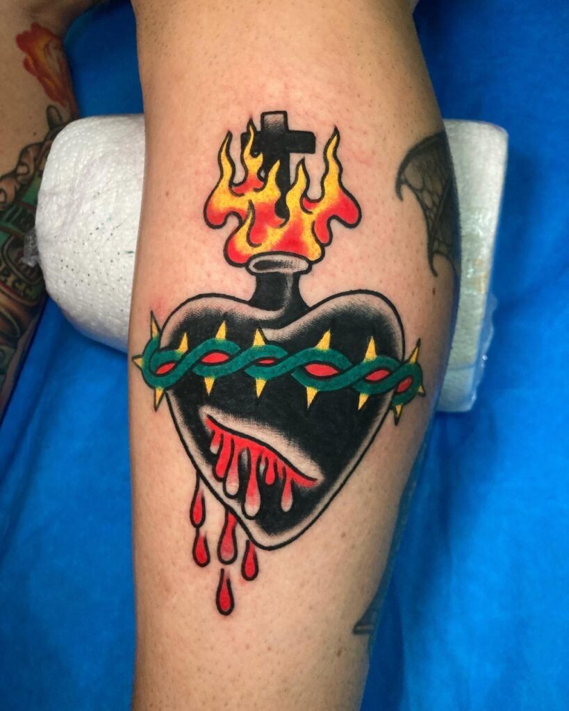 Traditional Sacred Heart Tattoo with Rose and Flames Tattoo Design