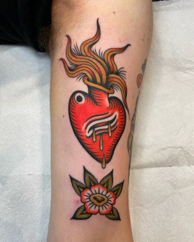 Traditional Sacred Heart with Flowers and Flames Tattoo Tattoo Design
