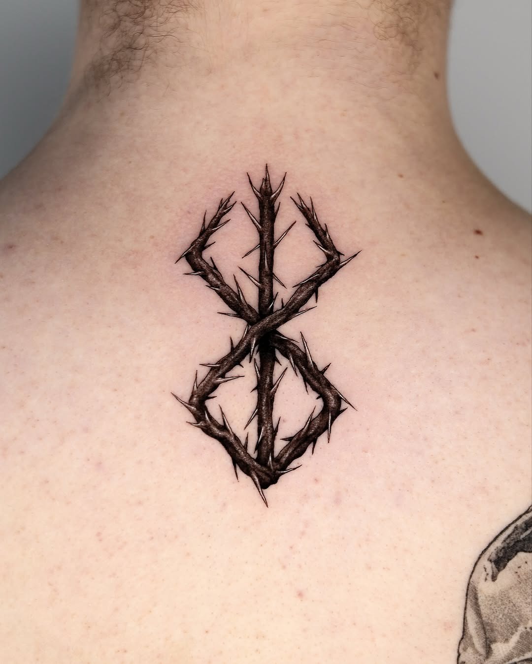 Intricate thorn design tattoo on back. Tattoo Design