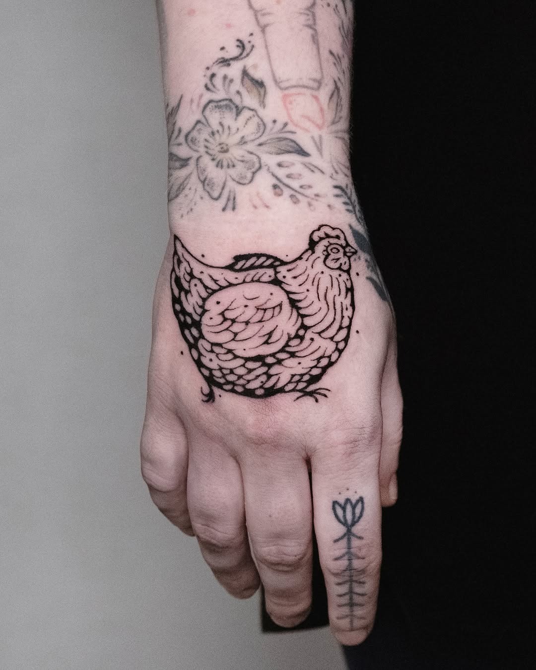 Unique Chicken Tattoo on Hand Reveal Tattoo Design