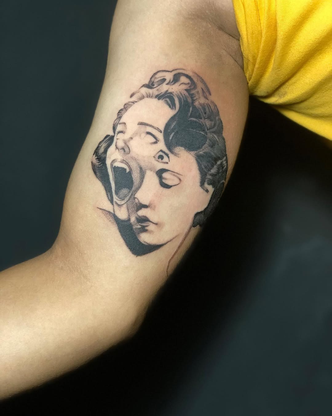 Dramatic contrast of sadness and despair Tattoo Design