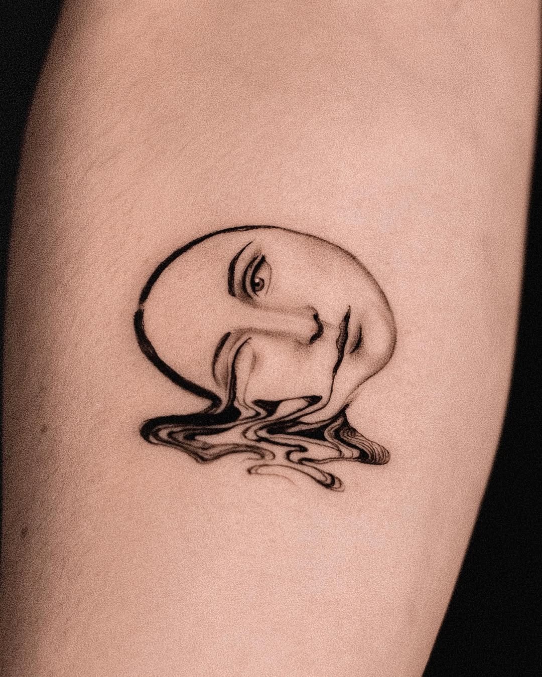 Emotional face tattoo with flowing hair design Tattoo Design