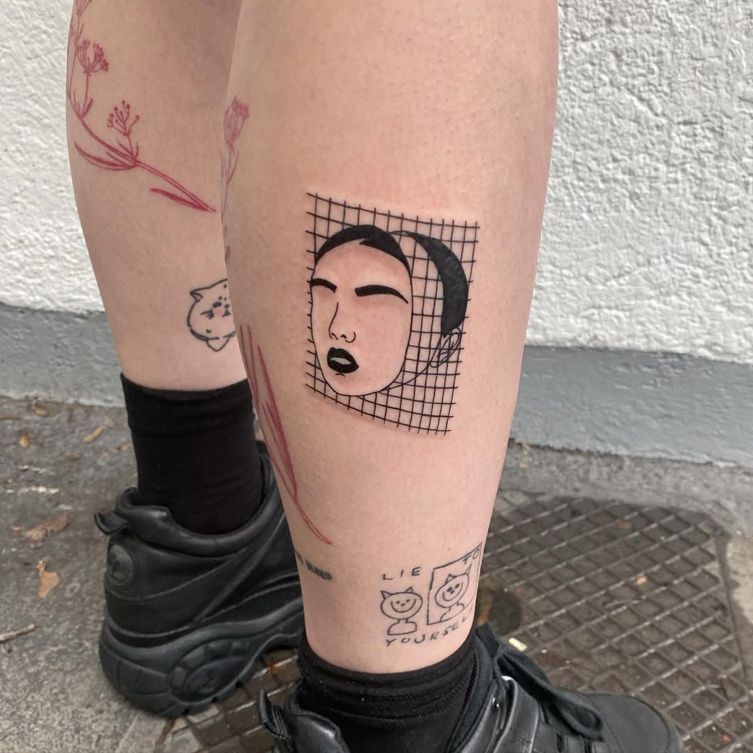 Emotional face tattoo with grid background Tattoo Design