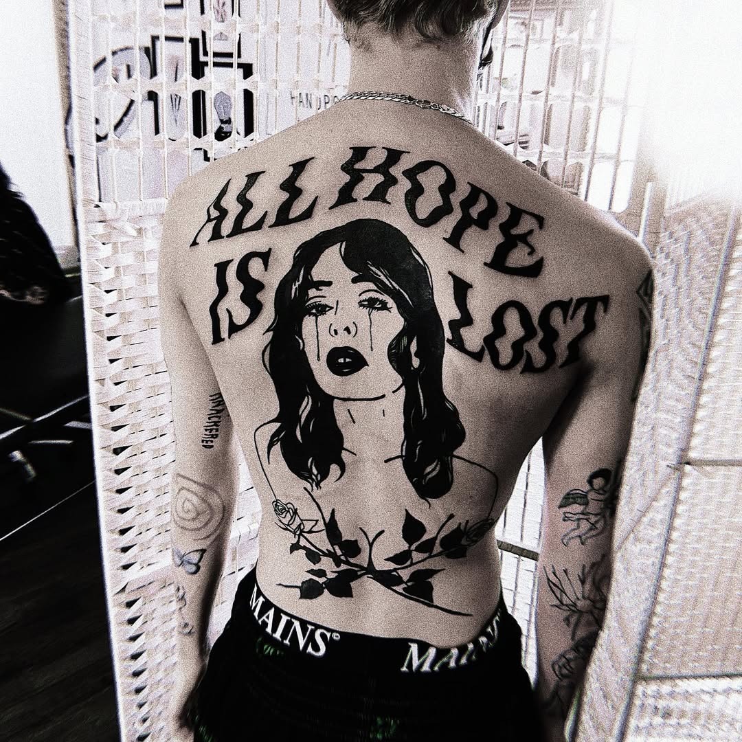 Expressive tattoos reflecting deep emotions and struggles Tattoo Design
