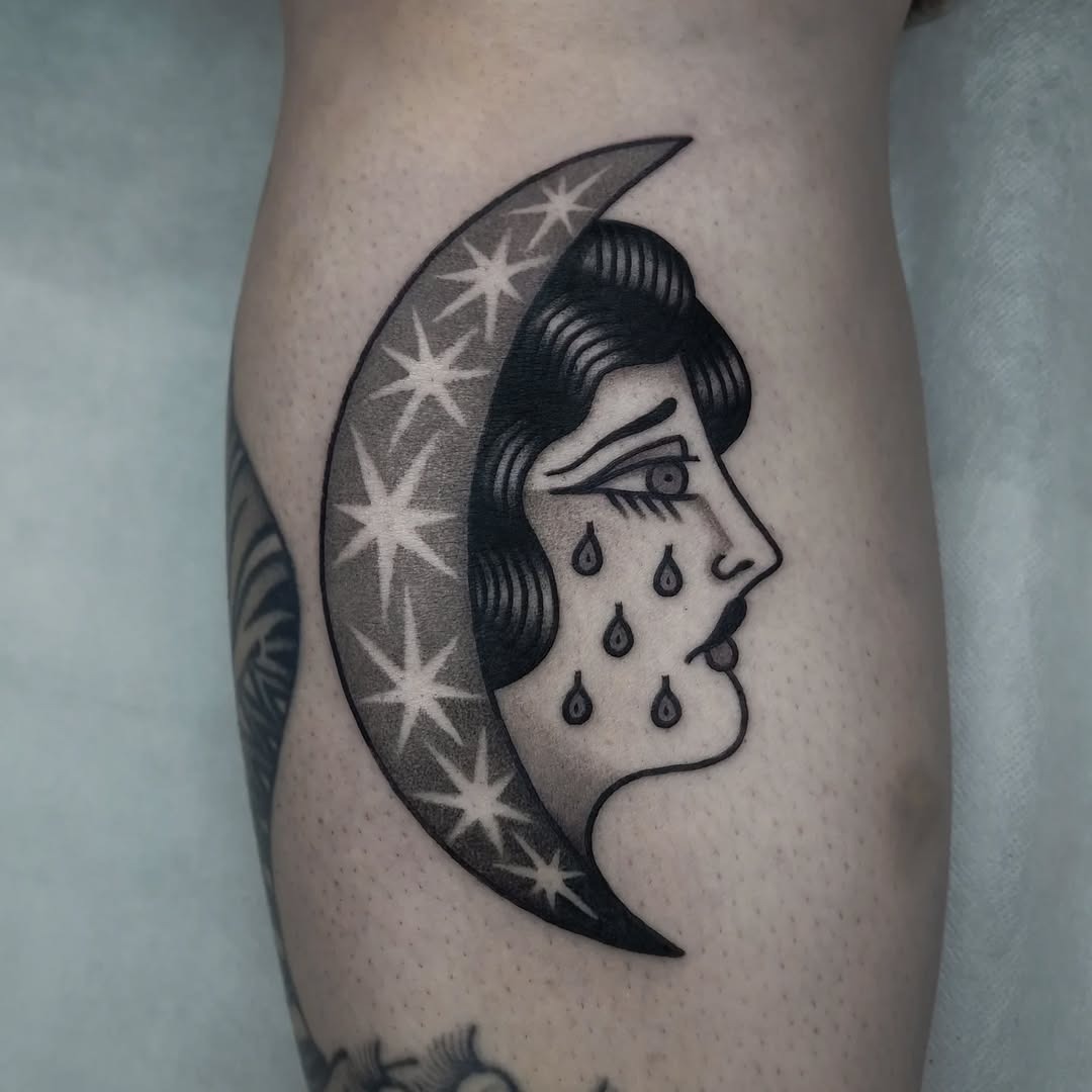 Melancholic moon face with teardrops tattoo Tattoo Design