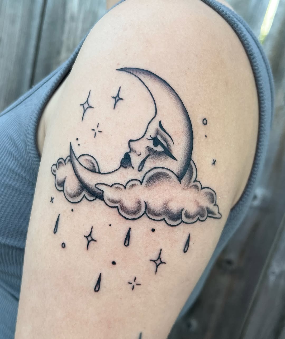 Melancholic moon with a tearful expression Tattoo Design