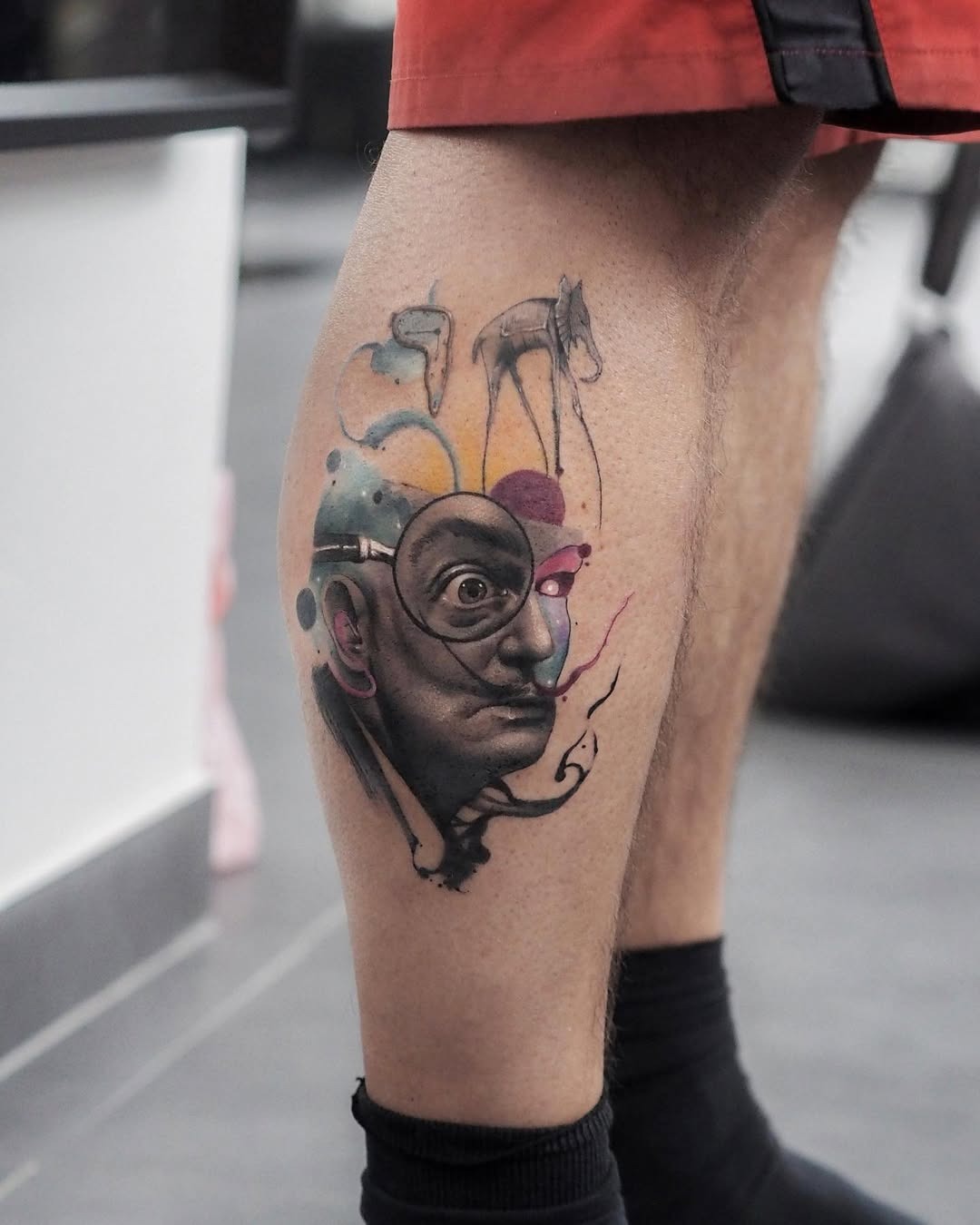 Captivating Salvador Dali-inspired tattoo art Tattoo Design