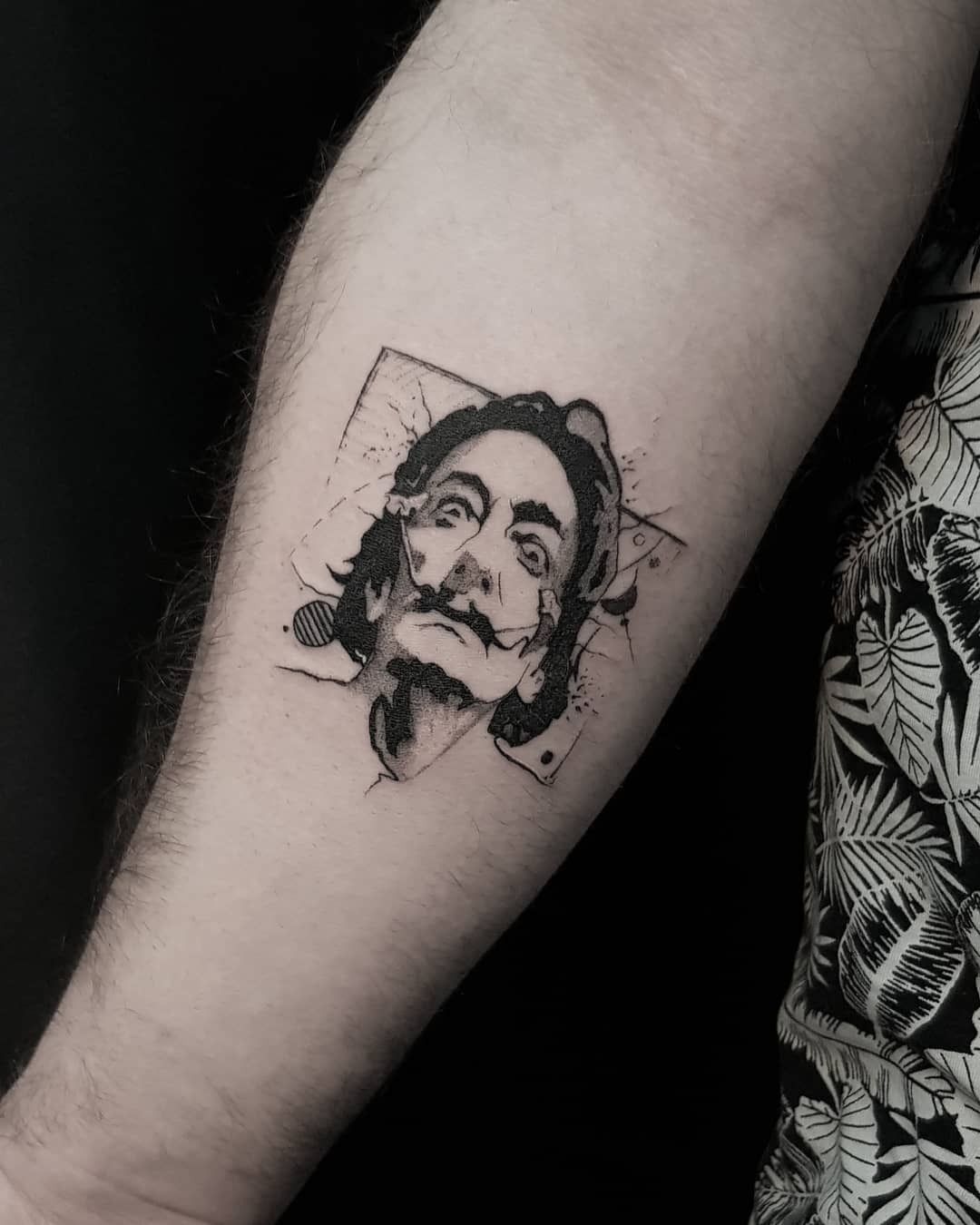 Intriguing Salvador Dali portrait tattoo design Tattoo Design