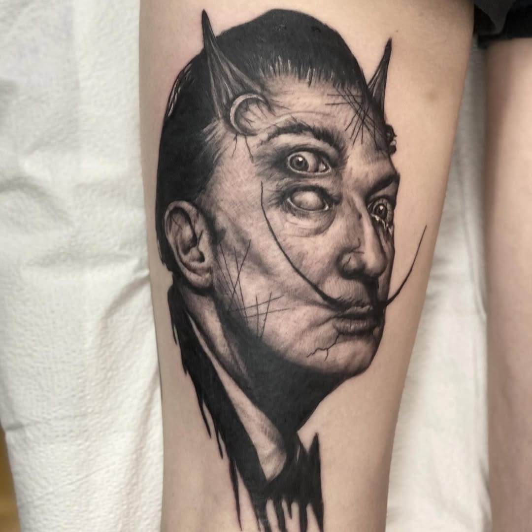 Striking Salvador Dali-inspired blackwork tattoo Tattoo Design