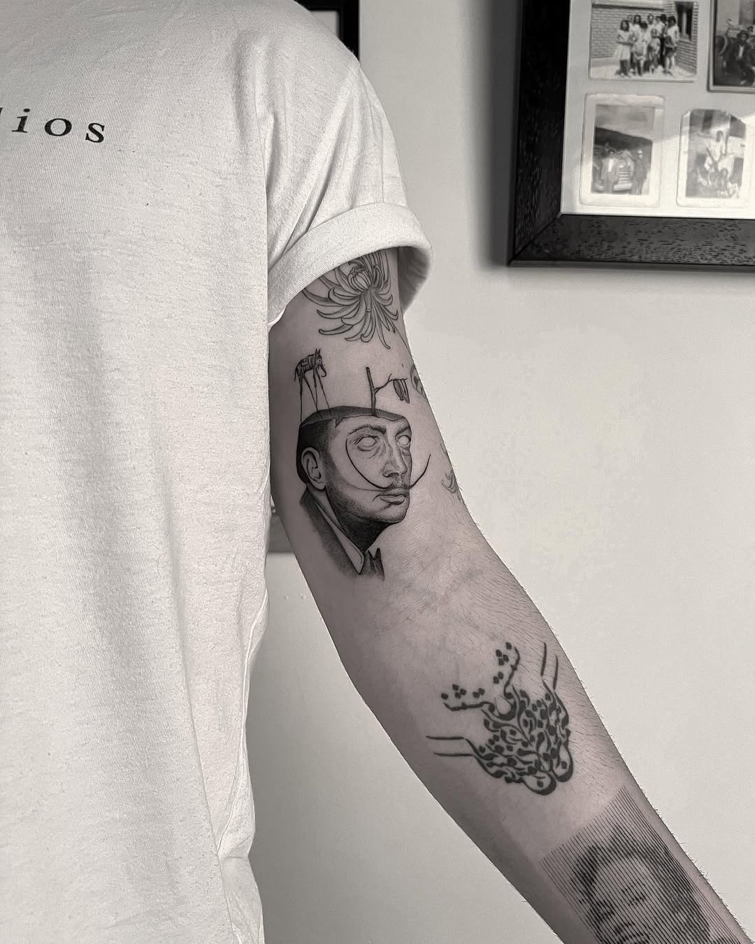 Stunning Salvador Dali Tattoo in Black Ink Tattoo Design