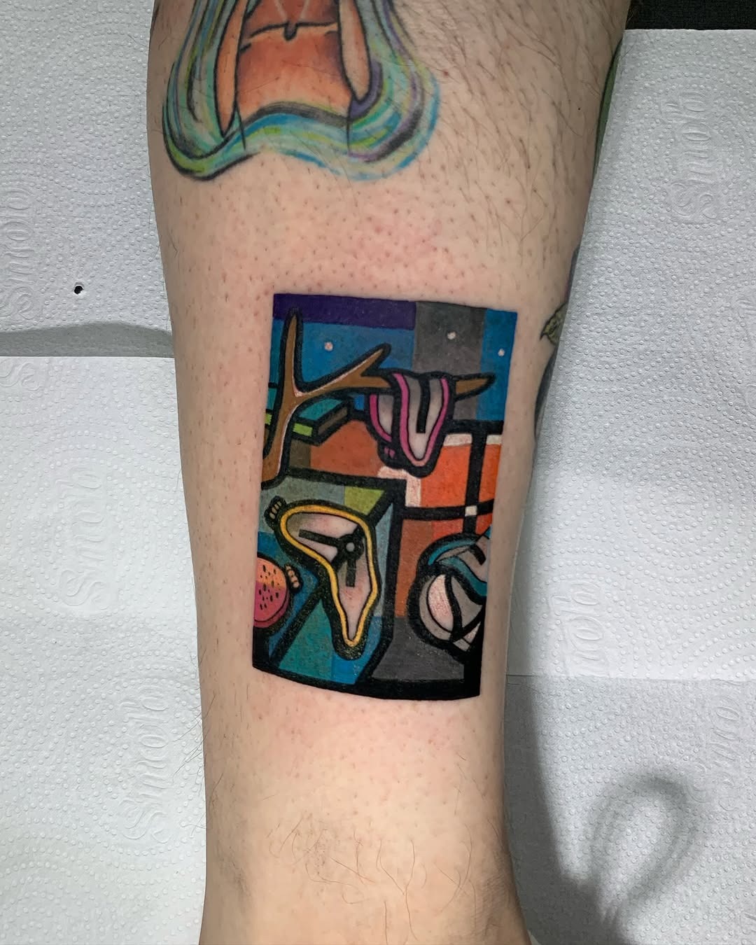 Surreal Salvador Dali-inspired leg tattoo design Tattoo Design
