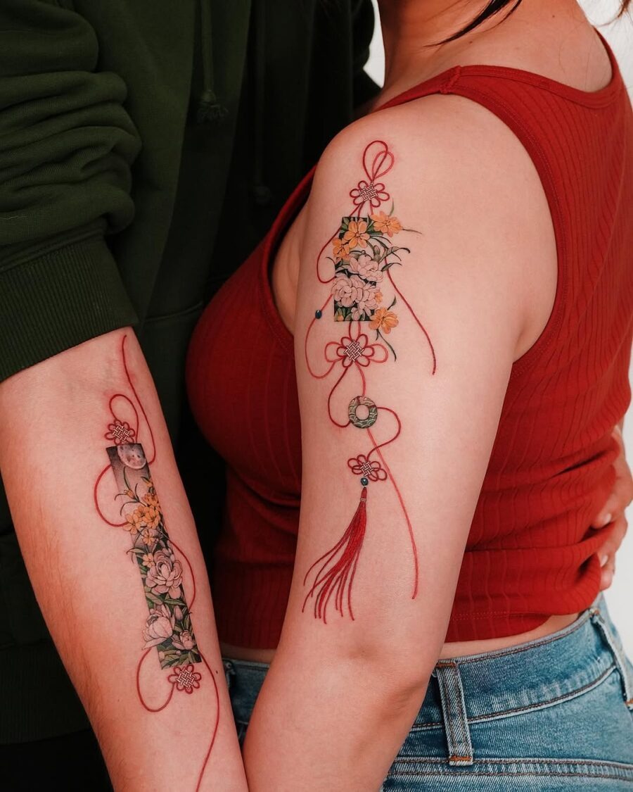 Beautiful couple tattoos featuring delicate floral designs Tattoo Design