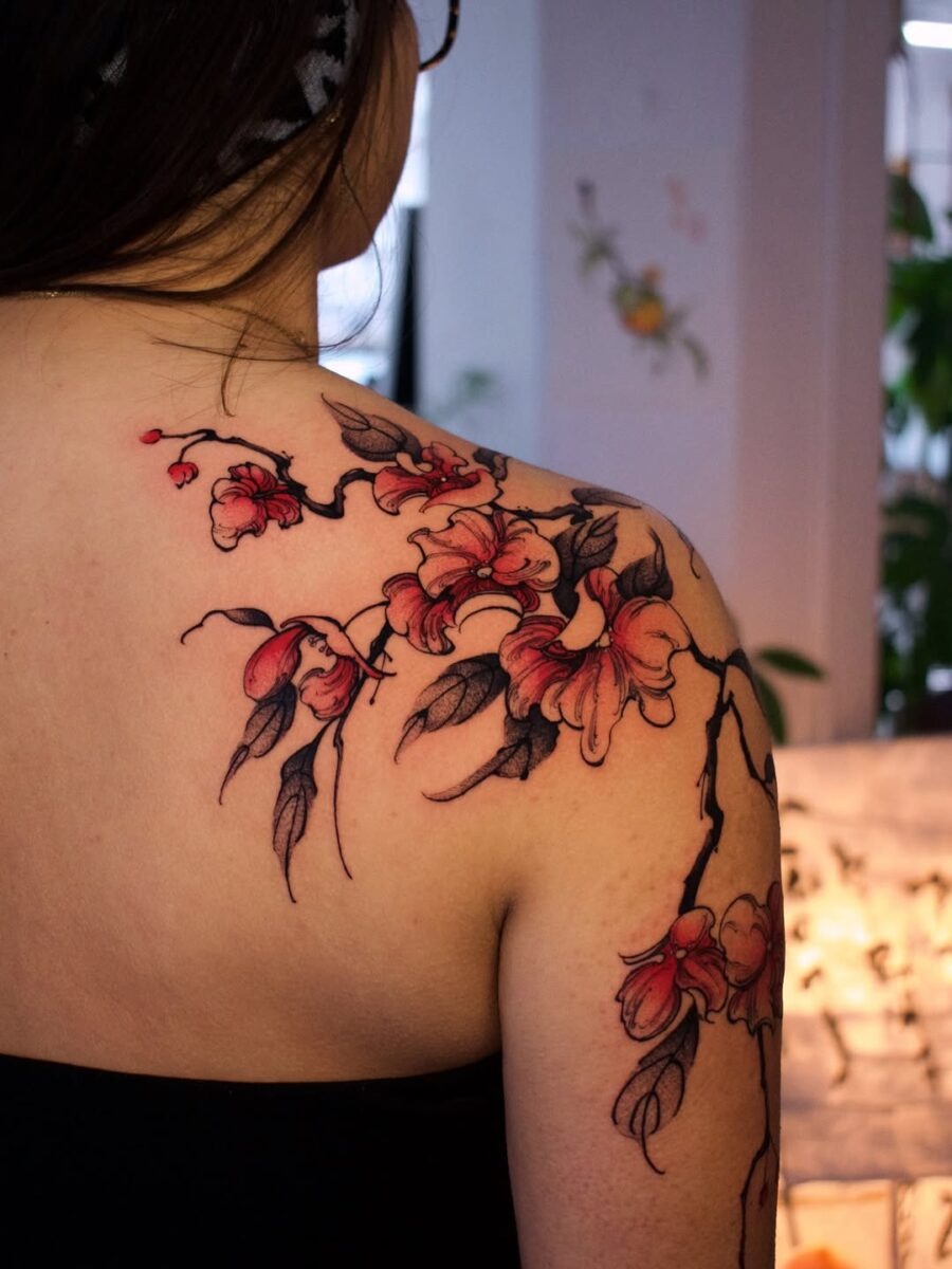 Captivating Sampaguita Tattoo on a Woman’s Back Tattoo Design