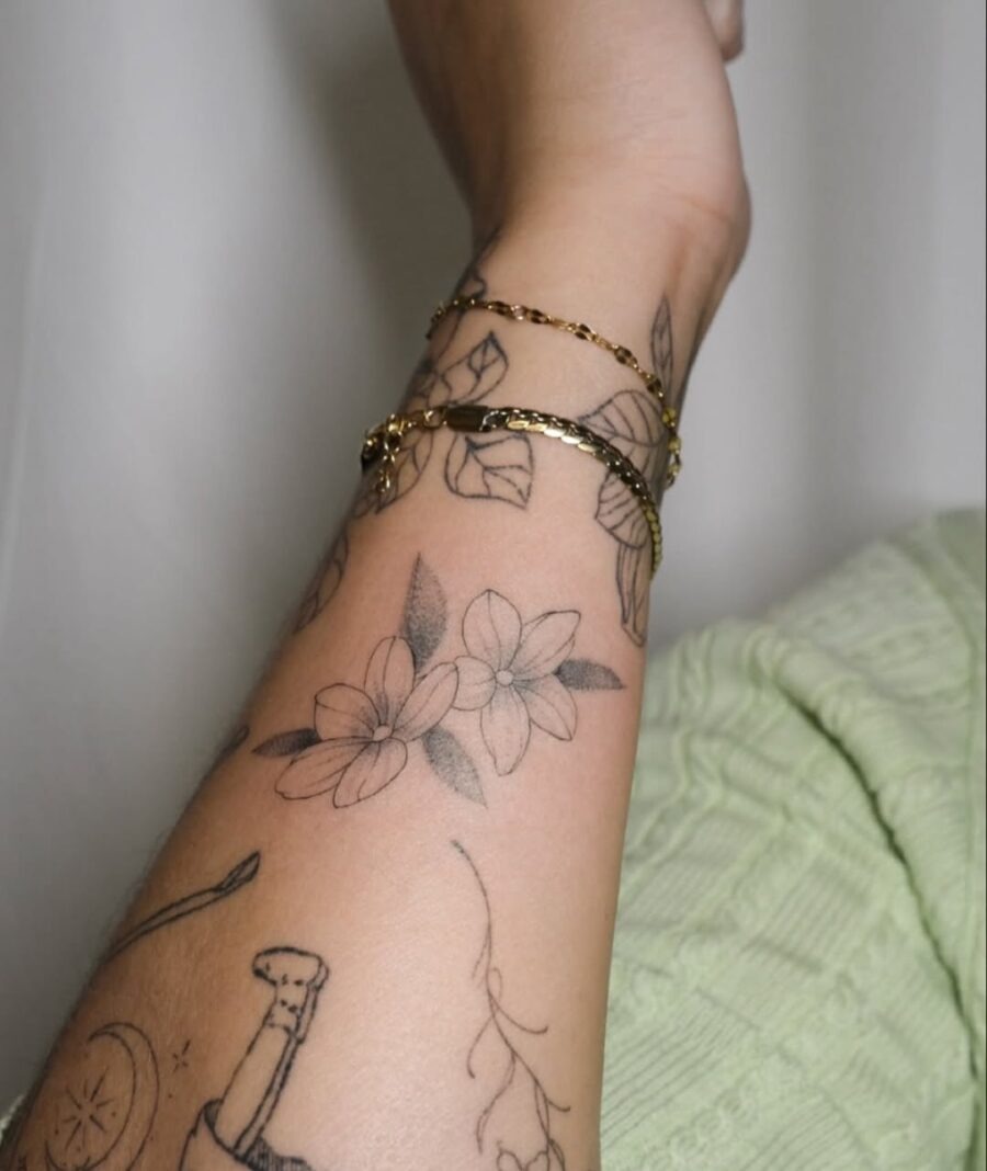Delicate sampaguita floral tattoo design on arm Tattoo Design
