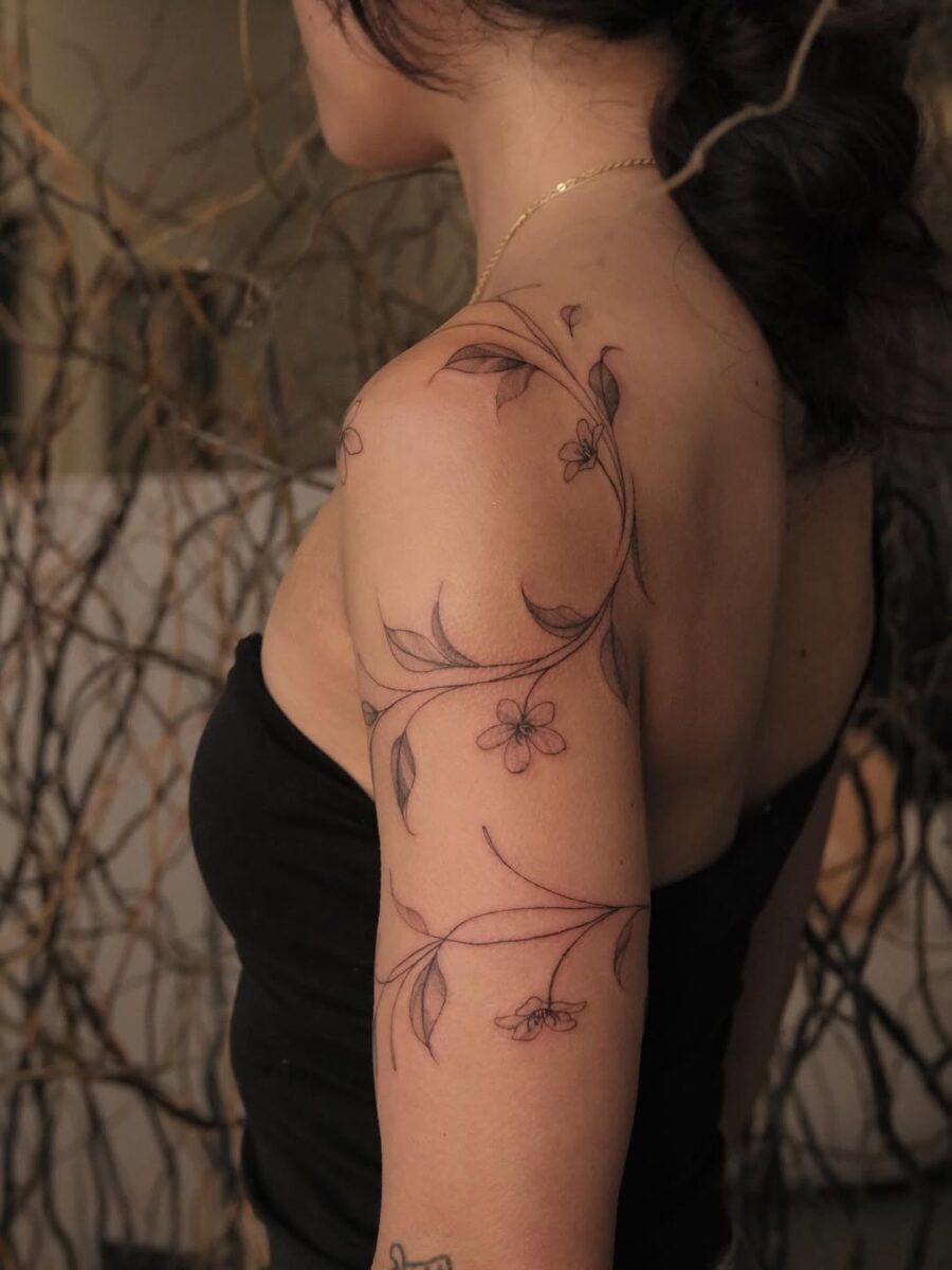 Elegant floral sampaguita tattoo adorns the arm Tattoo Design