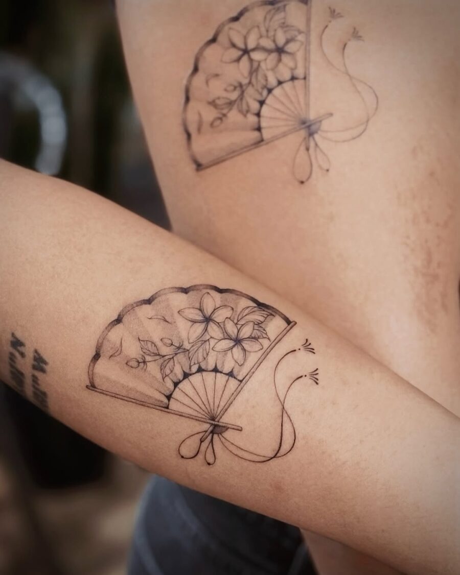 Elegant sampaguita fan tattoo with floral motifs Tattoo Design