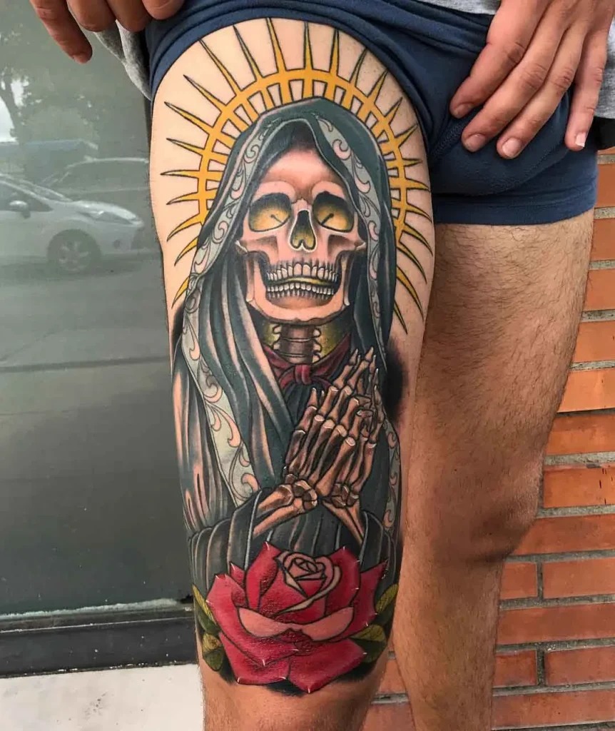 Bright and Bold Thigh Tattoo with Santa Muerte tattoo design