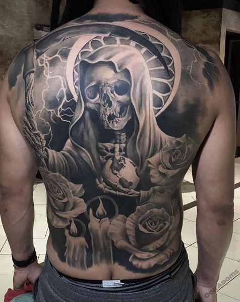 Santa Muerte with Lightning and Floral Accents tattoo design