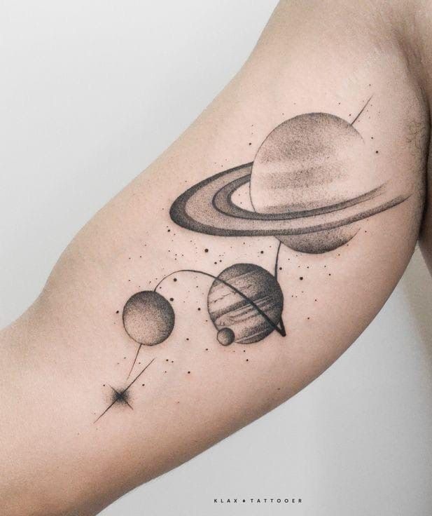 Delicate Saturn Sparkle Shoulder Tattoo Design
