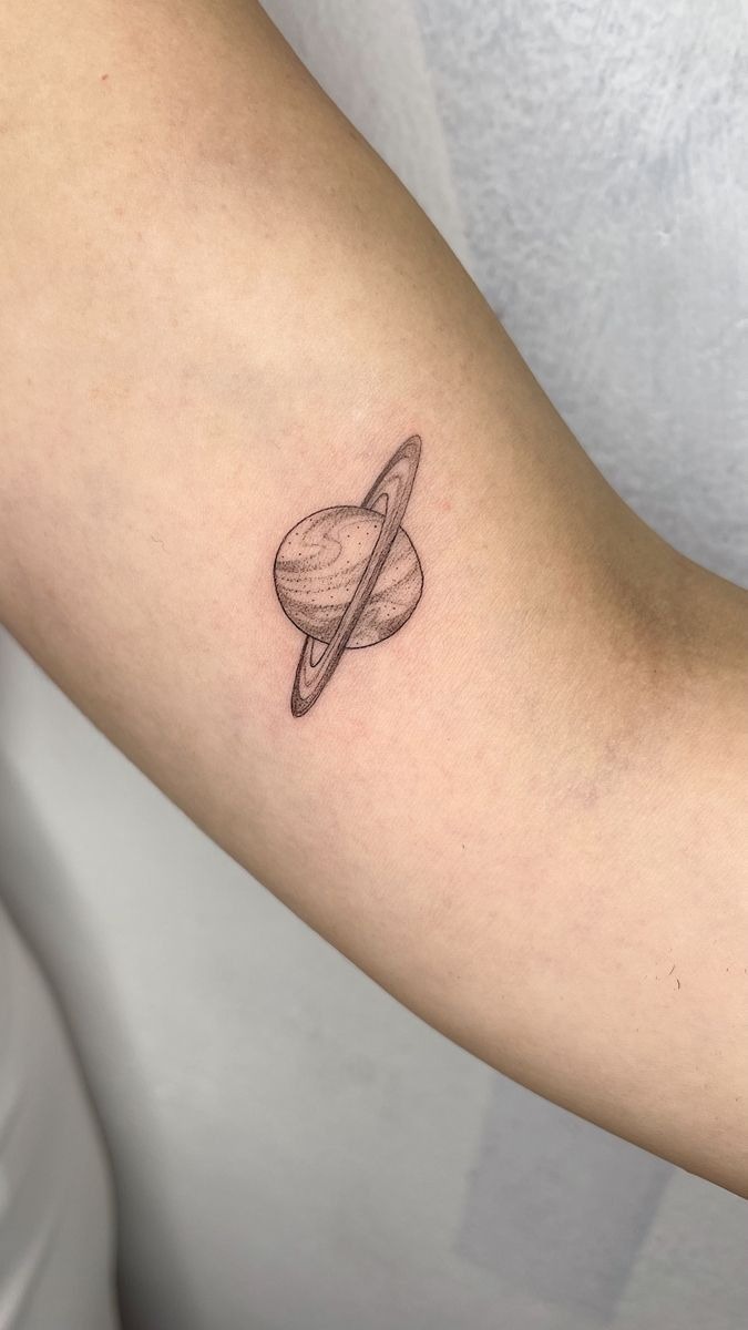 Micro Dot Saturn Symbol Tattoo Design