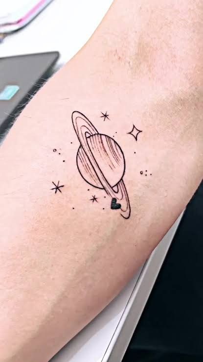 Saturn with Tiny Heart Accent Tattoo Design
