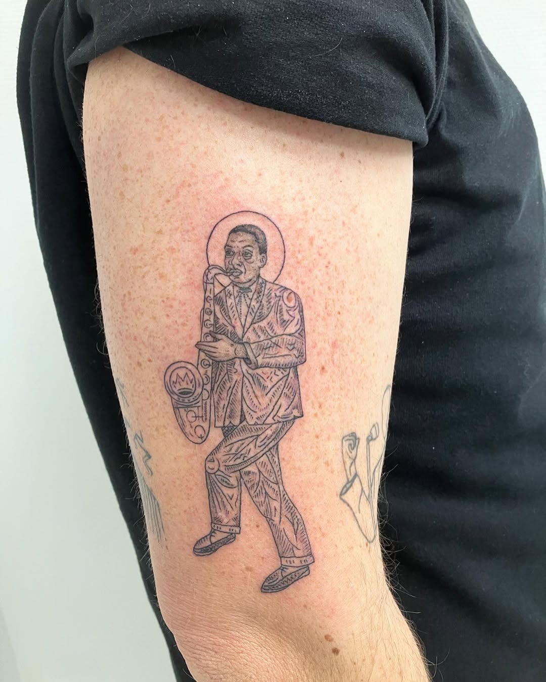 Stylish saxophone tattoo celebrating musical legacy Tattoo Design