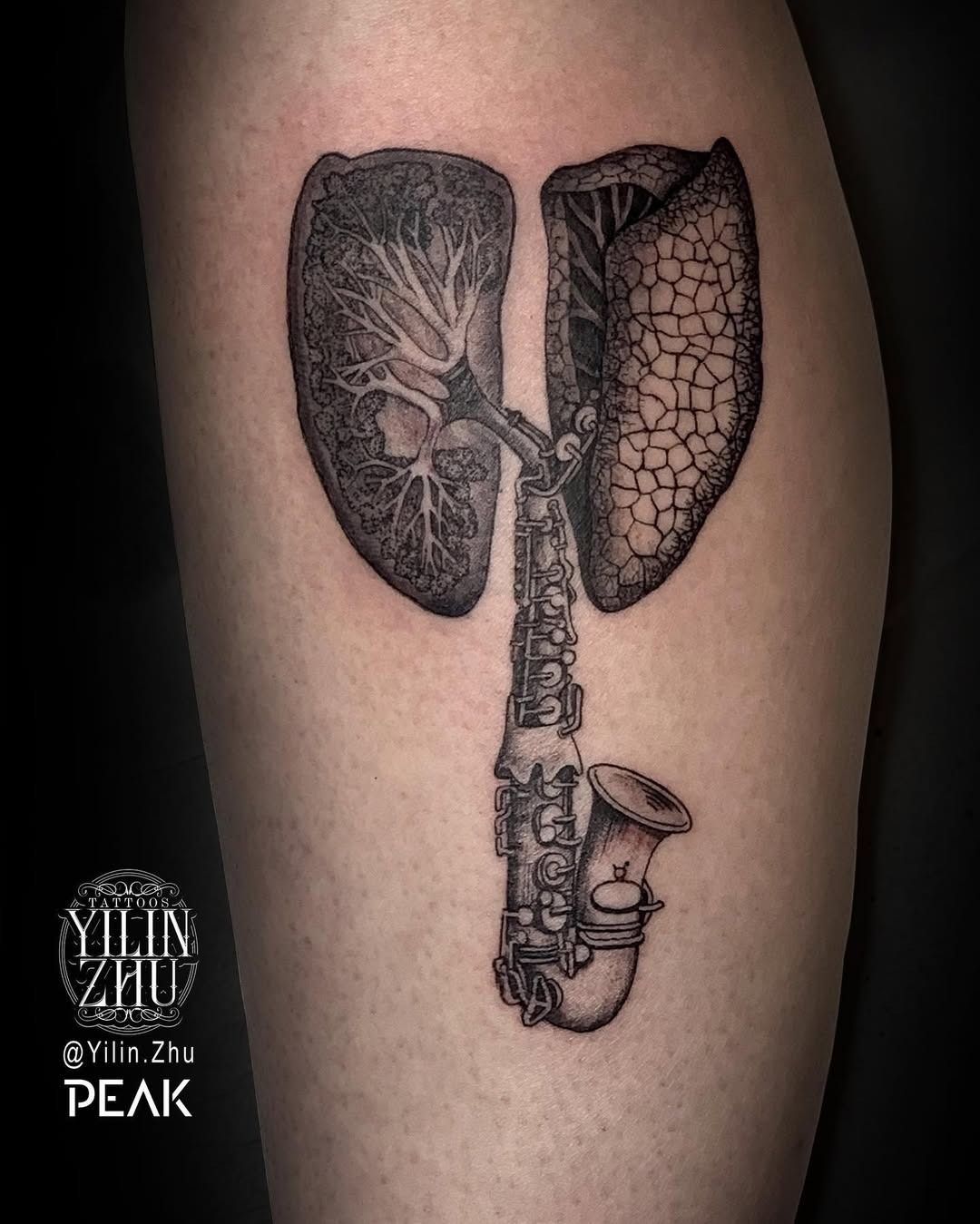 Unique lungs and saxophone tattoo design Tattoo Design