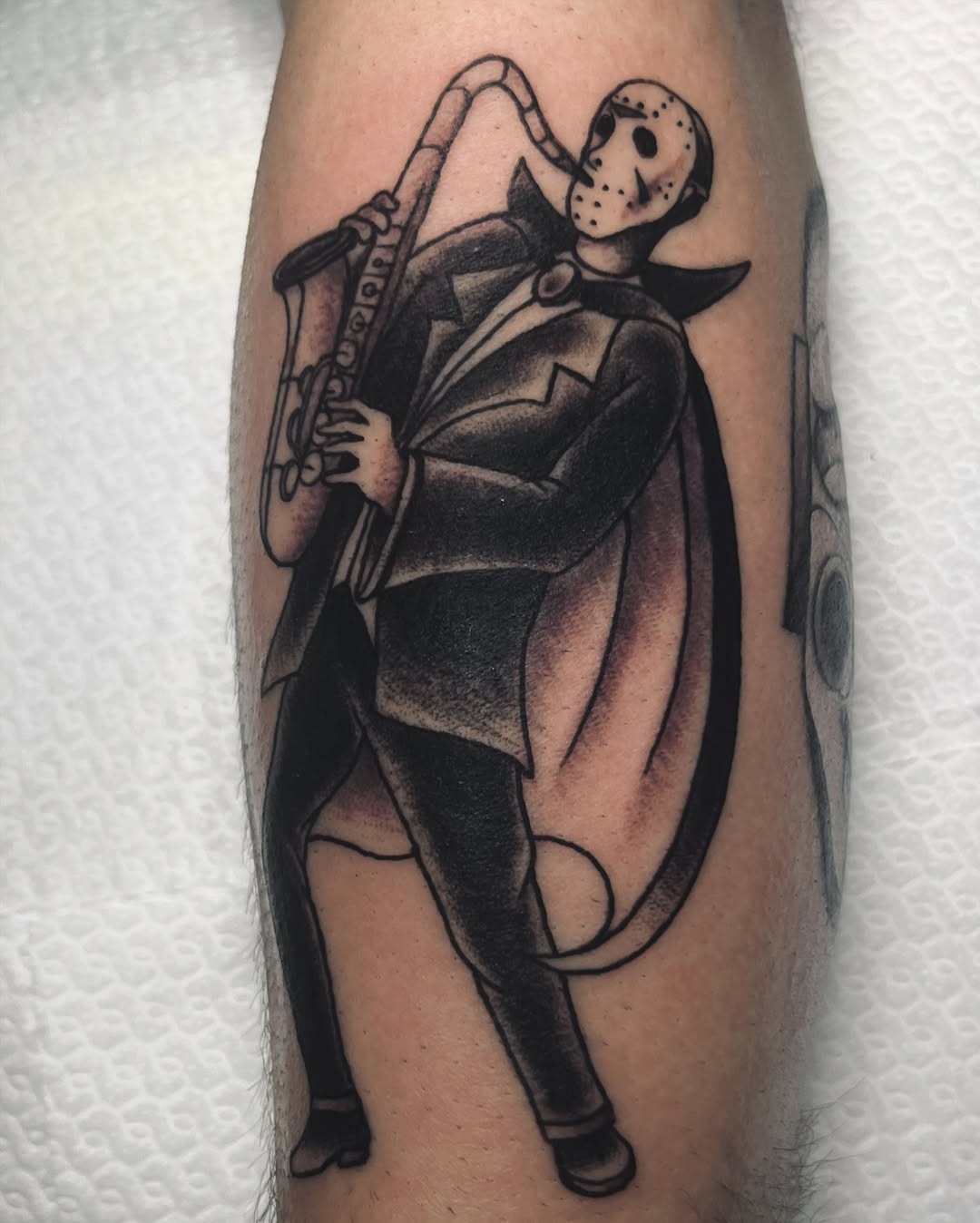 Unique saxophone tattoo featuring a horror twist Tattoo Design