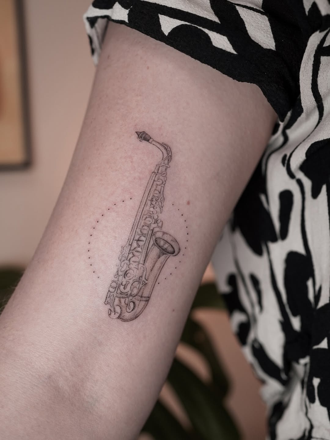 Unique saxophone tattoo showcasing artistic flair Tattoo Design