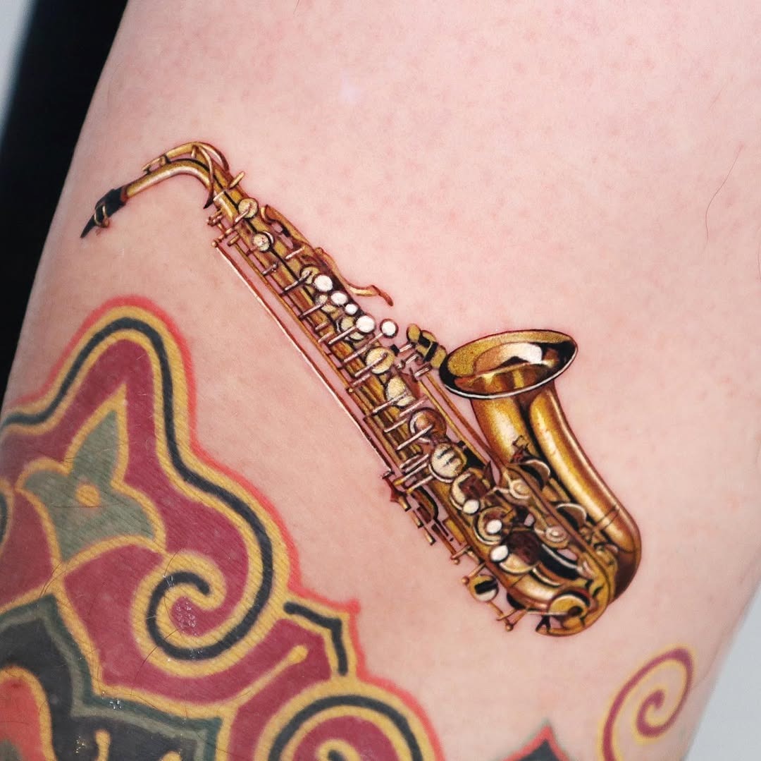 Vibrant saxophone tattoo with intricate details Tattoo Design