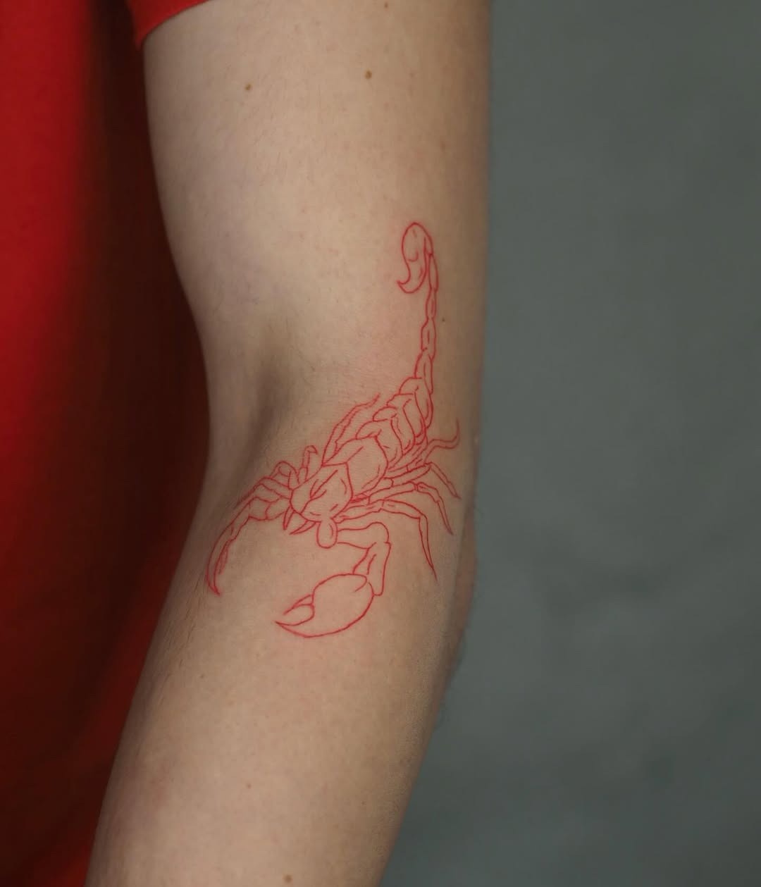 Bold Scorpio Tattoo in Striking Red Ink Tattoo Design