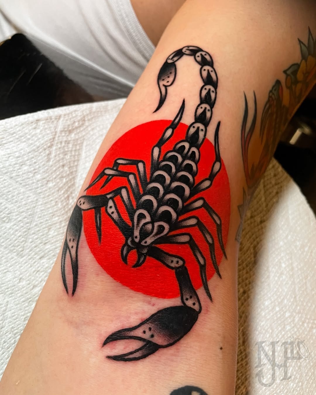 Bold Scorpio Tattoo on Vivid Red Background Tattoo Design