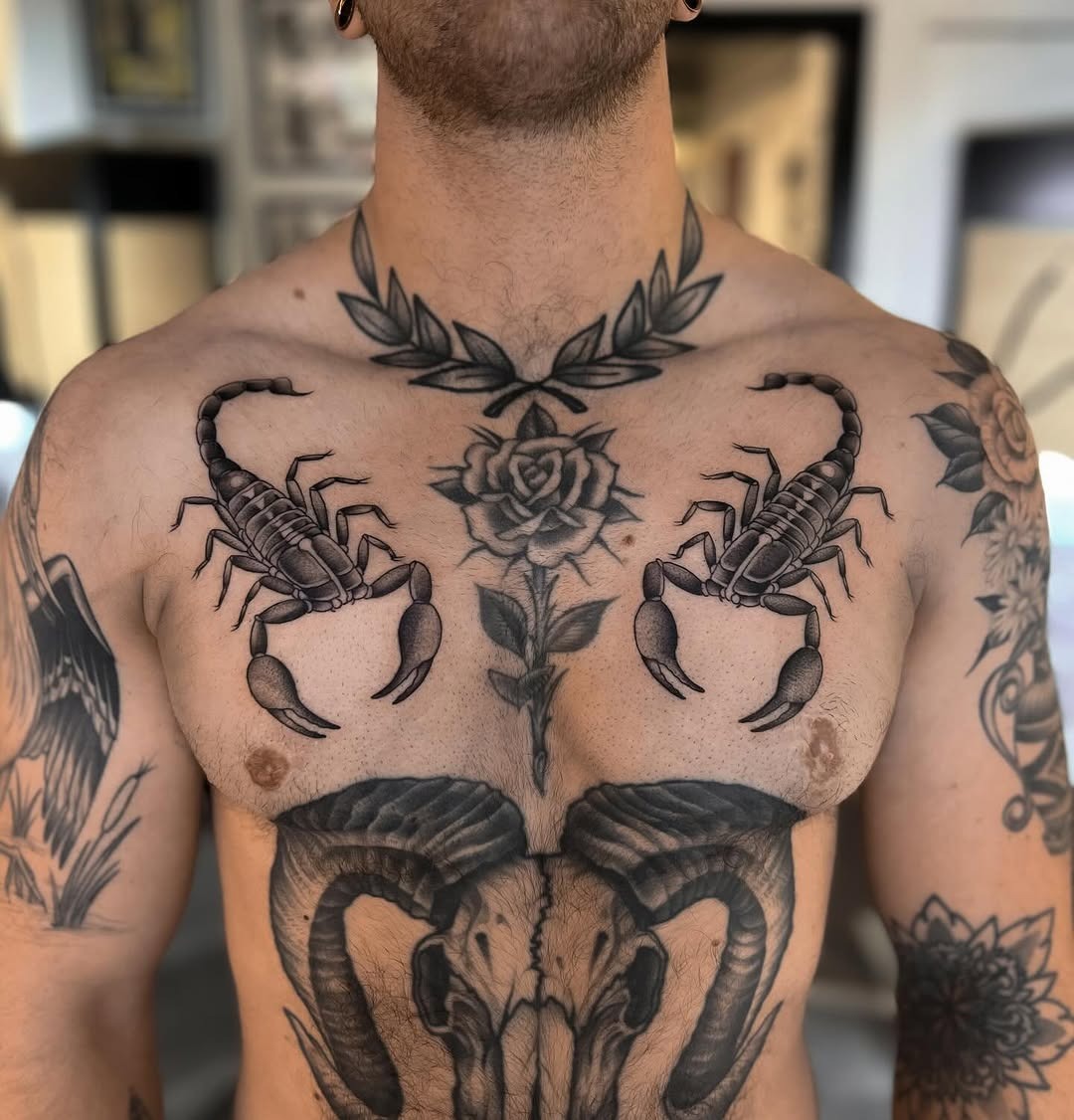 Bold Scorpio Tattoos with Floral Elements Tattoo Design