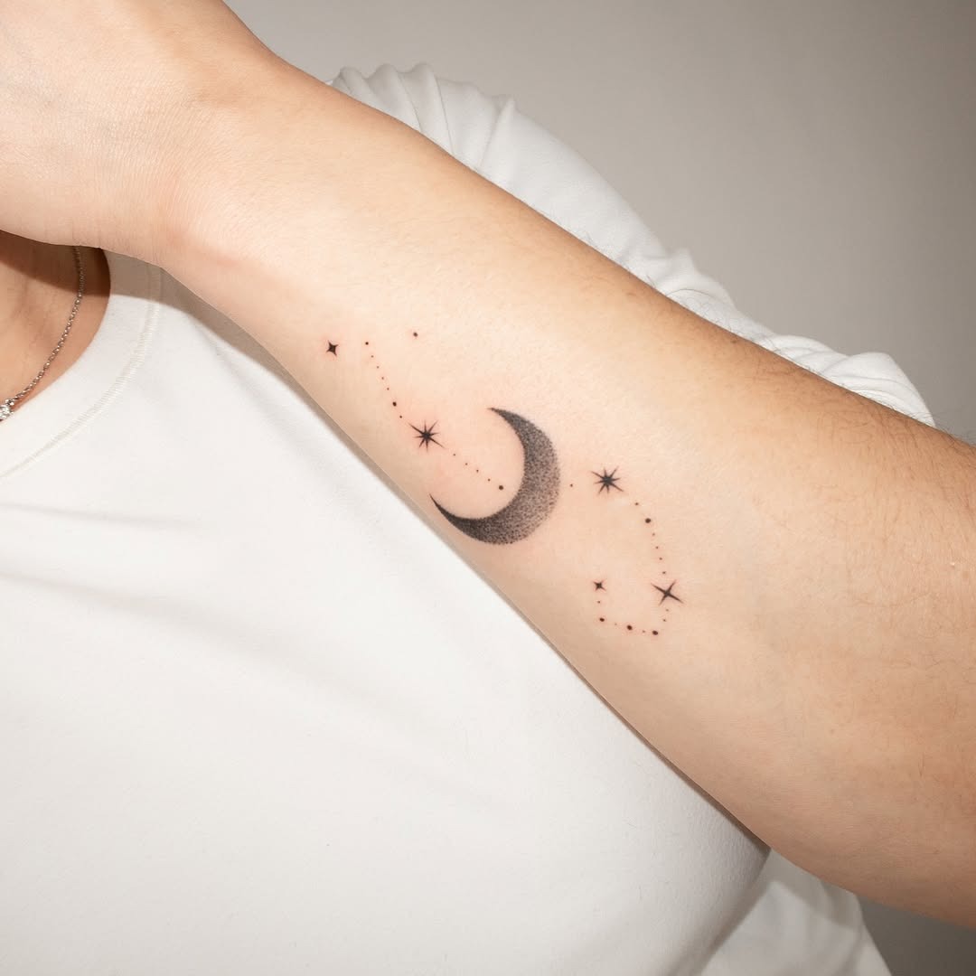 Elegant Scorpio Tattoo with Celestial Elements Tattoo Design