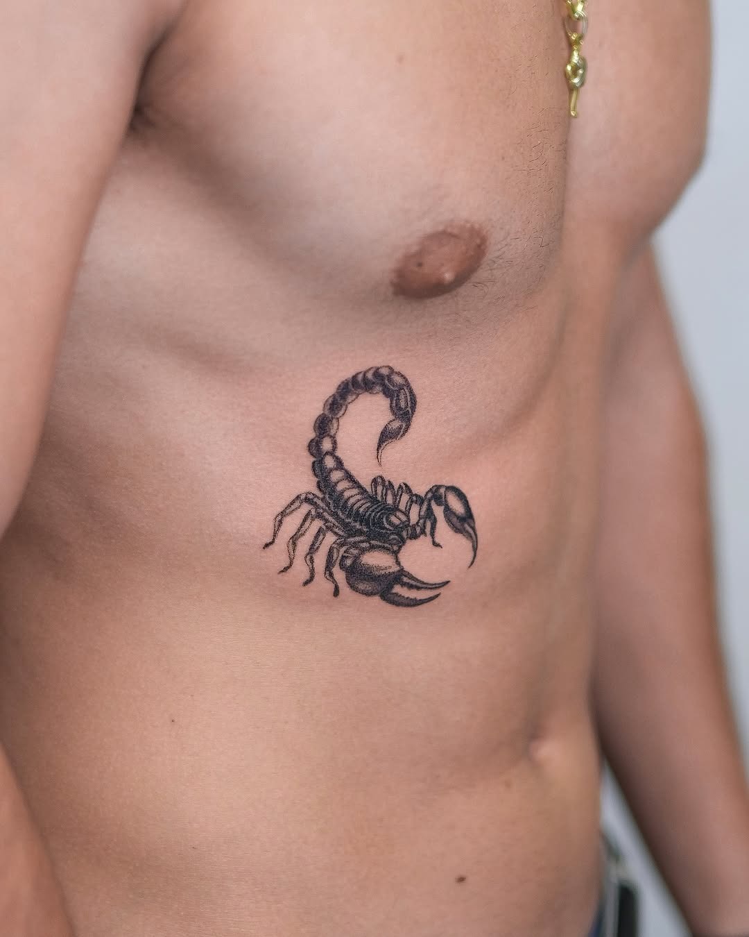 Fierce Scorpio Tattoo on Male Rib Cage Tattoo Design
