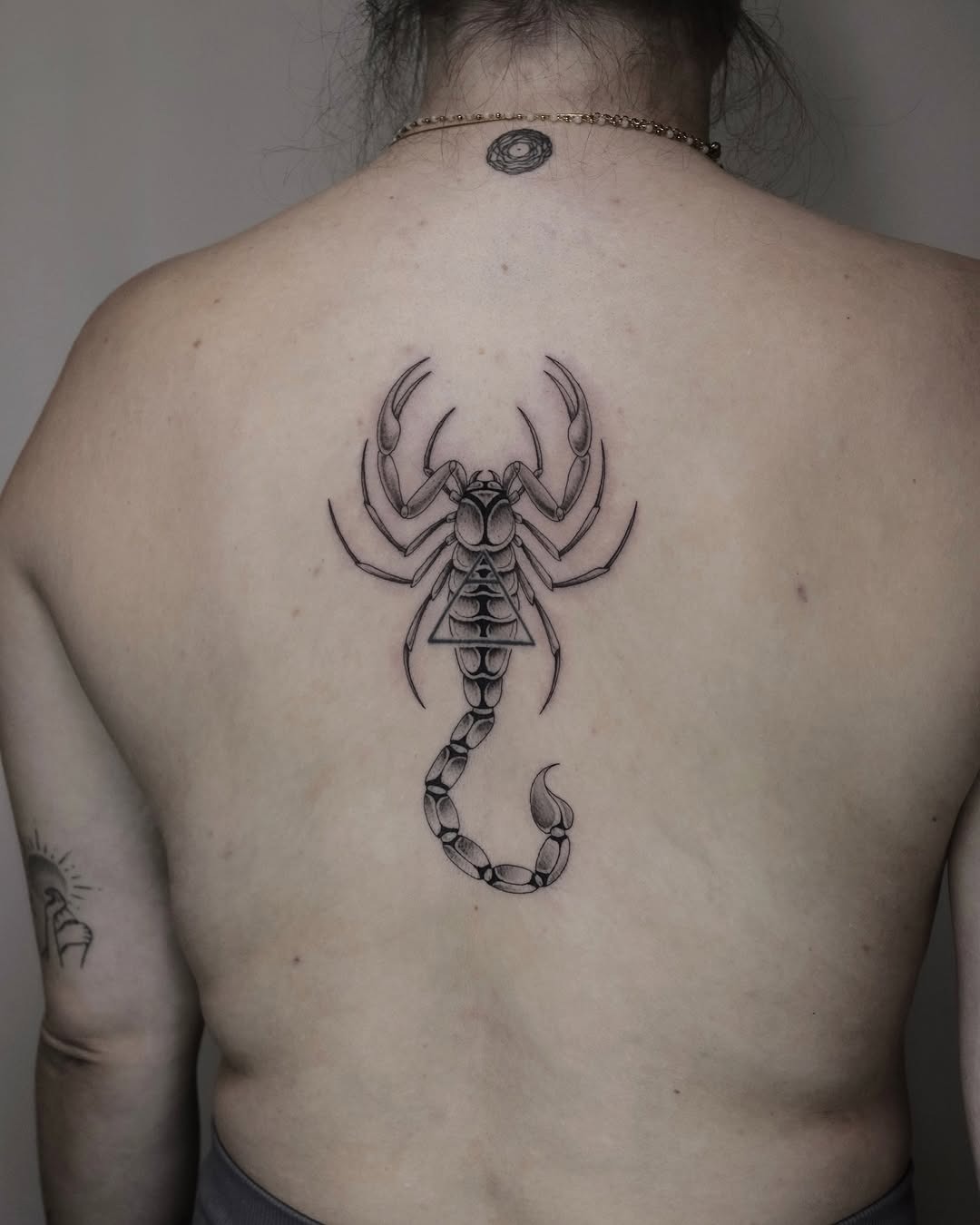 Intricate Scorpio tattoo on the back Tattoo Design