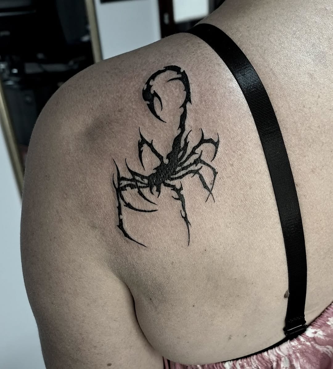 Stylish scorpion tattoo showcasing bold black ink Tattoo Design