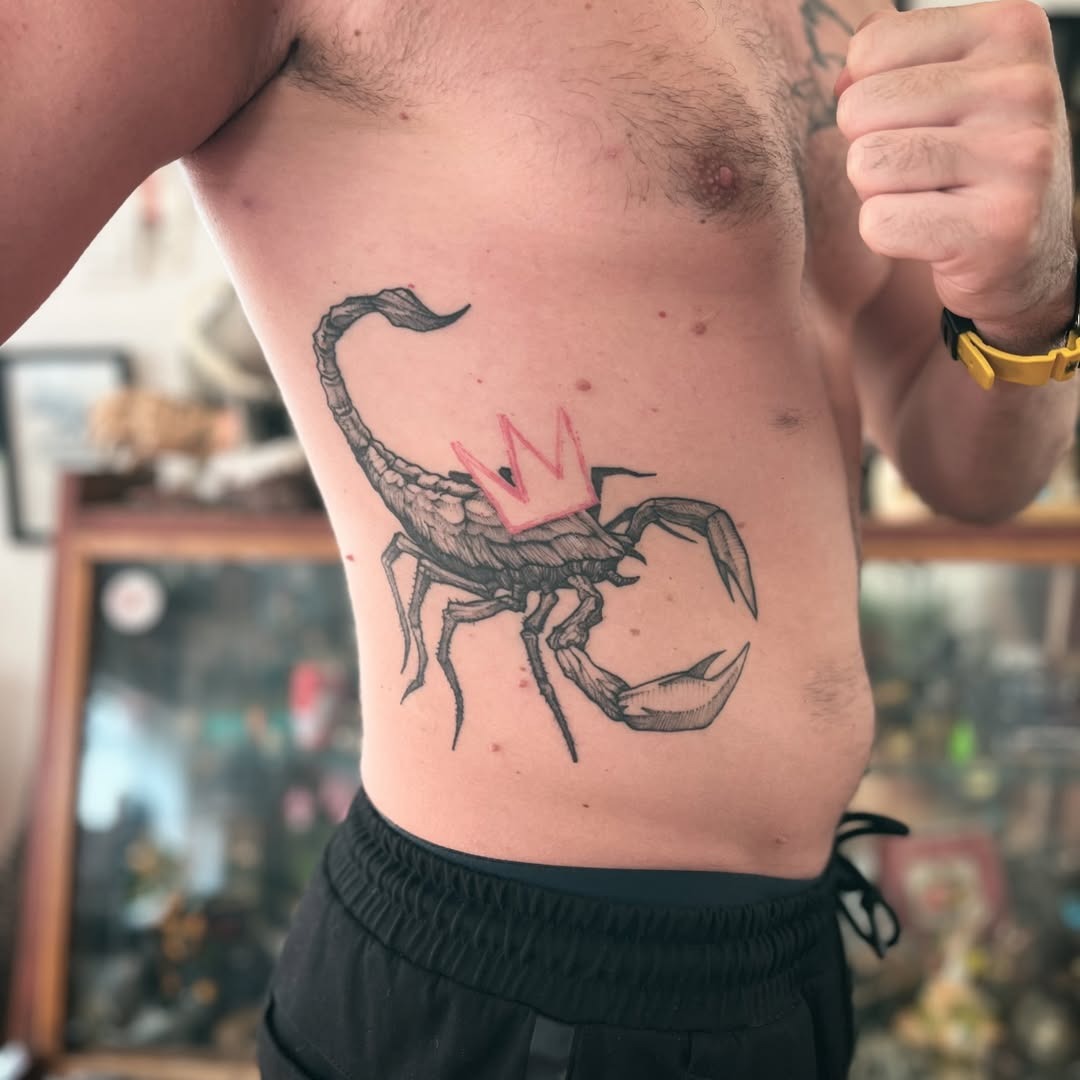 Stylish scorpion tattoo with a royal twist Tattoo Design