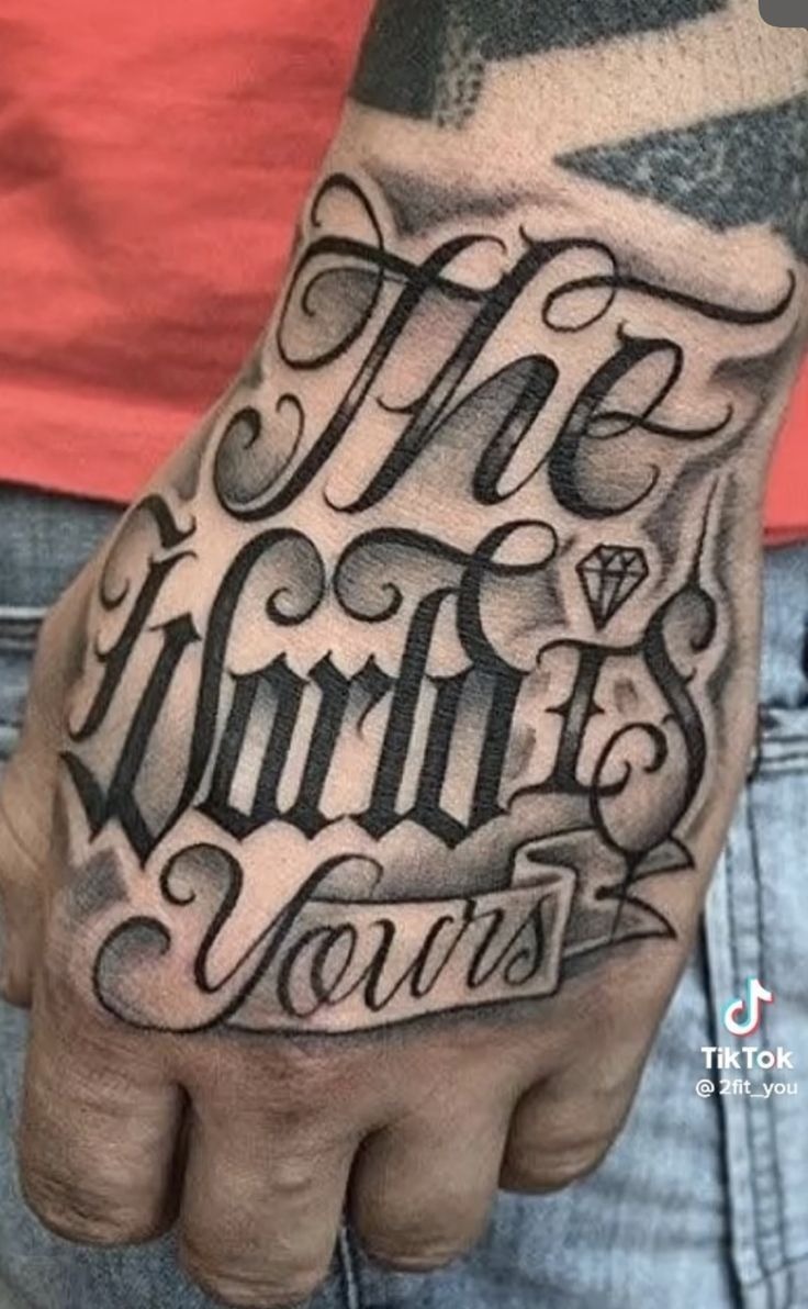 Chicano-Style Script Hand Tattoo Tattoo Design