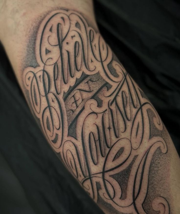 Dense Script Tattoo with Shadowing Tattoo Design