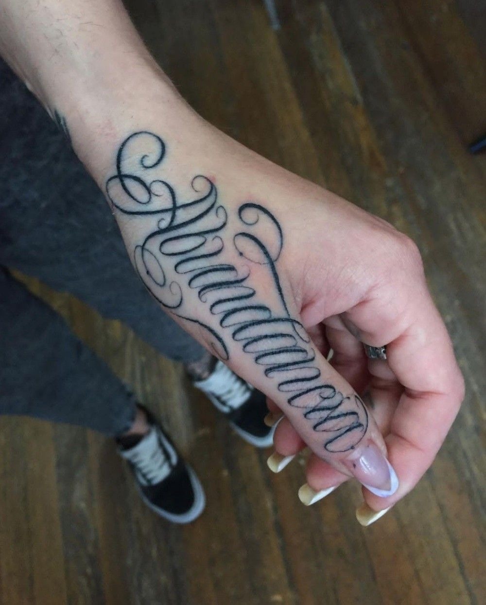 Elegant Script Hand Name Tattoo Tattoo Design