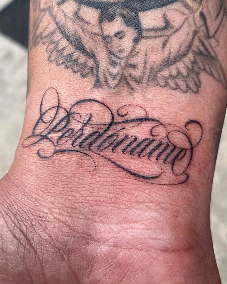Soft Script Wrist Name Tattoo Tattoo Design