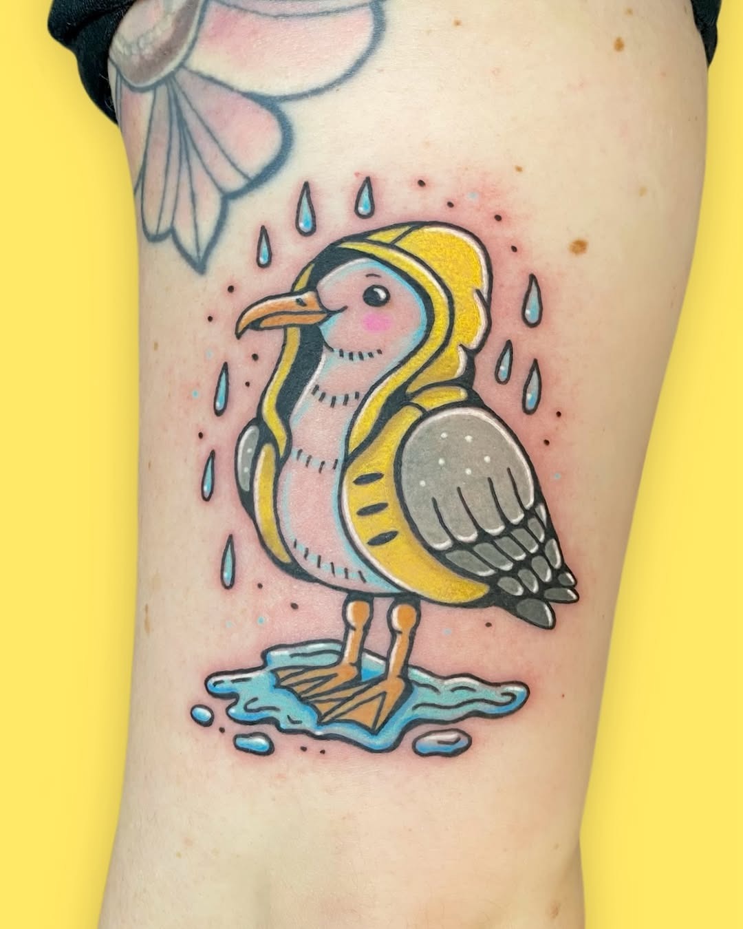 Adorable seagull in a raincoat tattoo design Tattoo Design