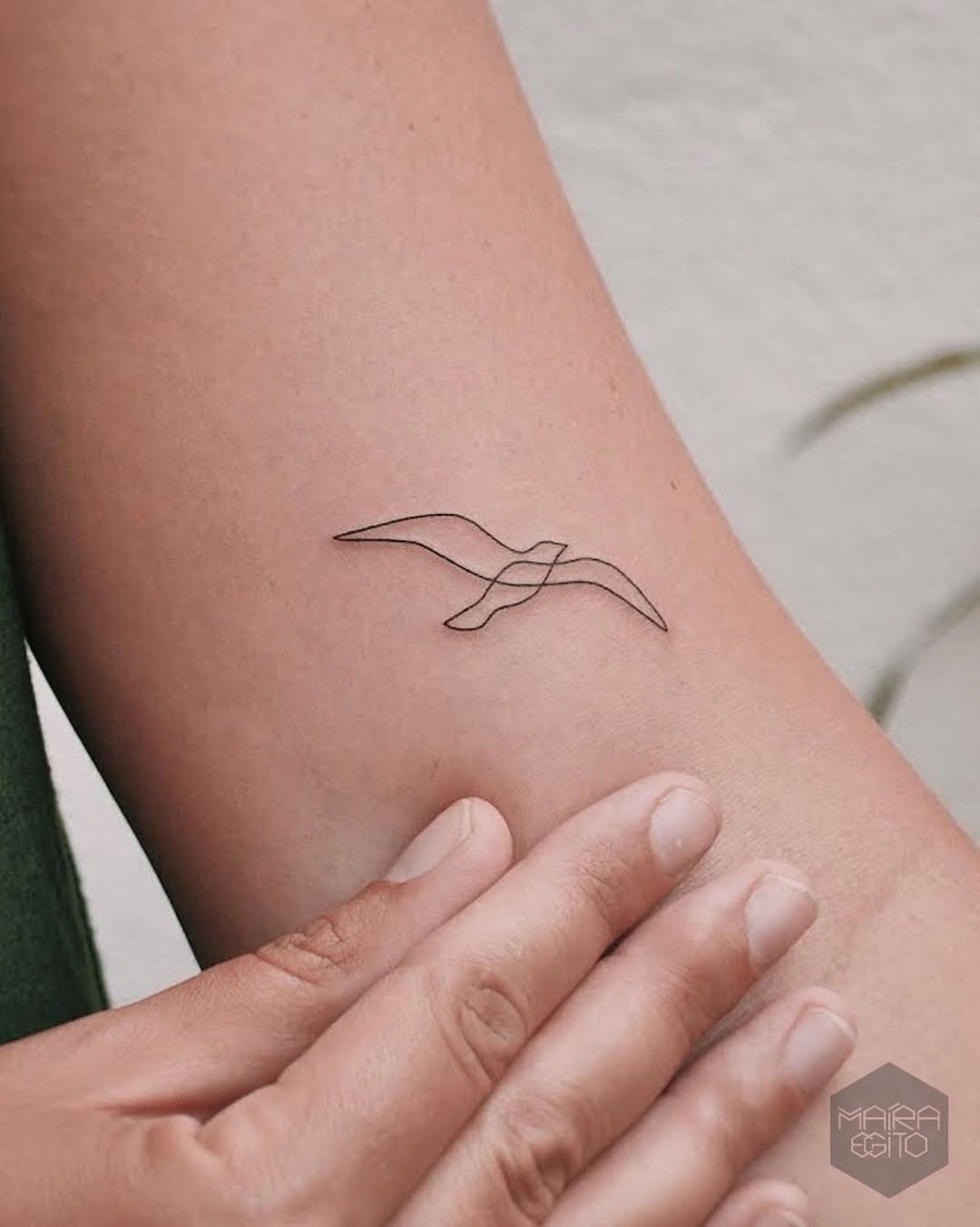 Elegant minimalist seagull tattoo design Tattoo Design